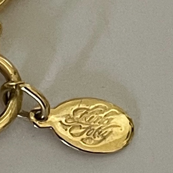 VINTAGE KIRKS FOLLY LUCKY CHARM GOLD TONED BRACELET SZ  7.5”  $75 - Picture 5 of 6